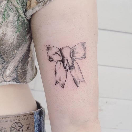 bow tattoo meaning and designs