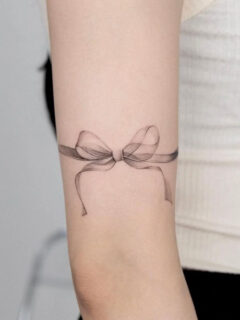 bow tattoo meaning and designs ideas