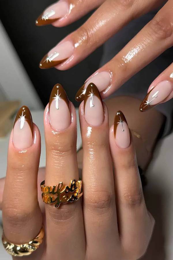 Brown French Tip Nails with Star Accents