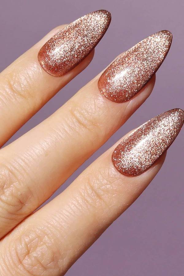 Glittery Brown Cat Eye Nails
