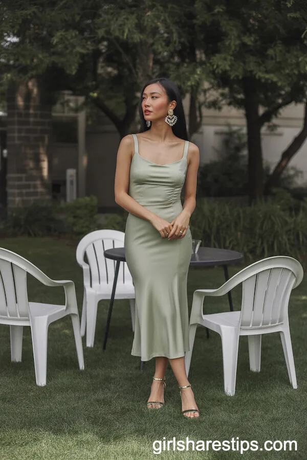 Fitted Sage Green Midi Dress with Statement Earrings and Ankle-Strap Sandals