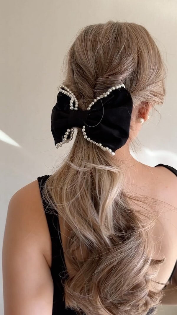 Twisted Ponytail With Pearl Bow