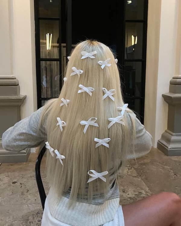 Scattered White Bows Holiday Hairstyle
