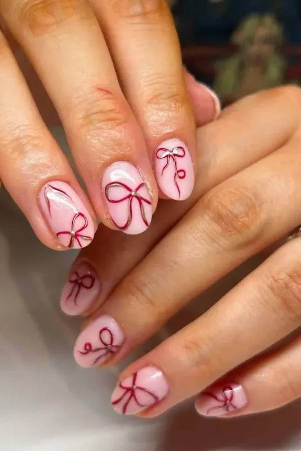 Cute Pink Bow Christmas Nail Design