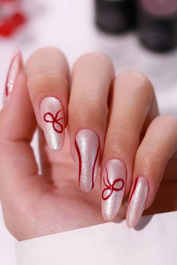 Silver and Red Bow Holiday Nails