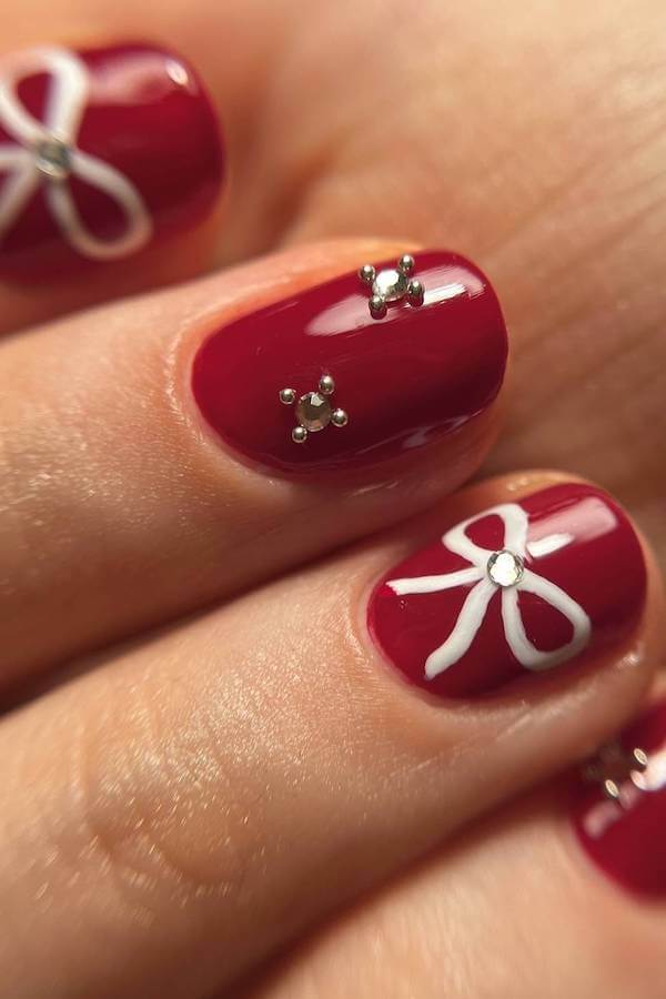Red Christmas Nails with White Bow Art