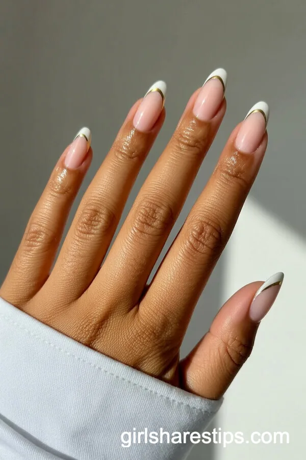 Milky Pink Natural Nails with Ultra-Slim Gold French Tips
