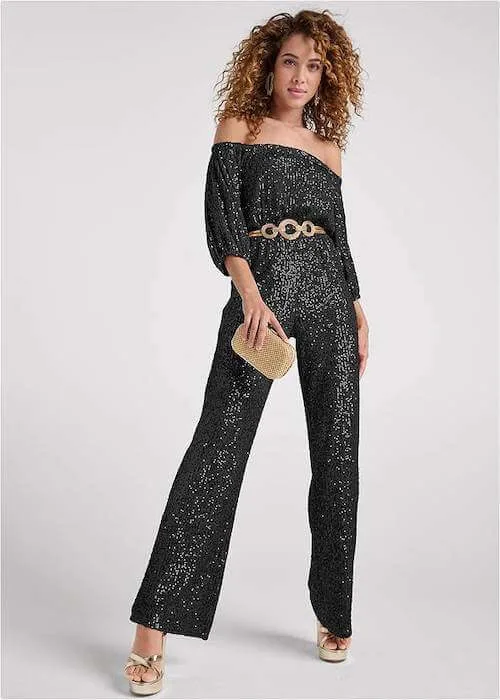 black jumpsuit and gold belt for a black and gold party