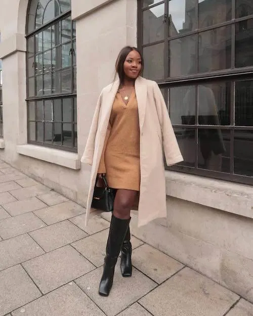 a beautiful black woman wearing chic first date outfit for a chill coffee date