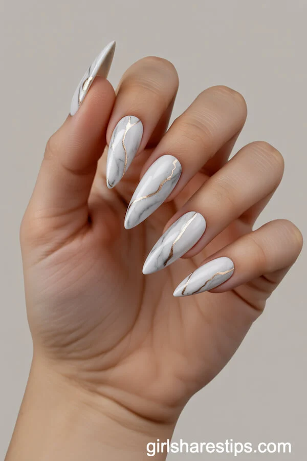 Stiletto Marble Nails with Fine Gold Veins