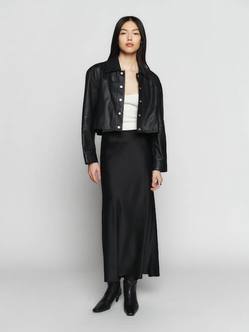 black jacket and black slip skirt