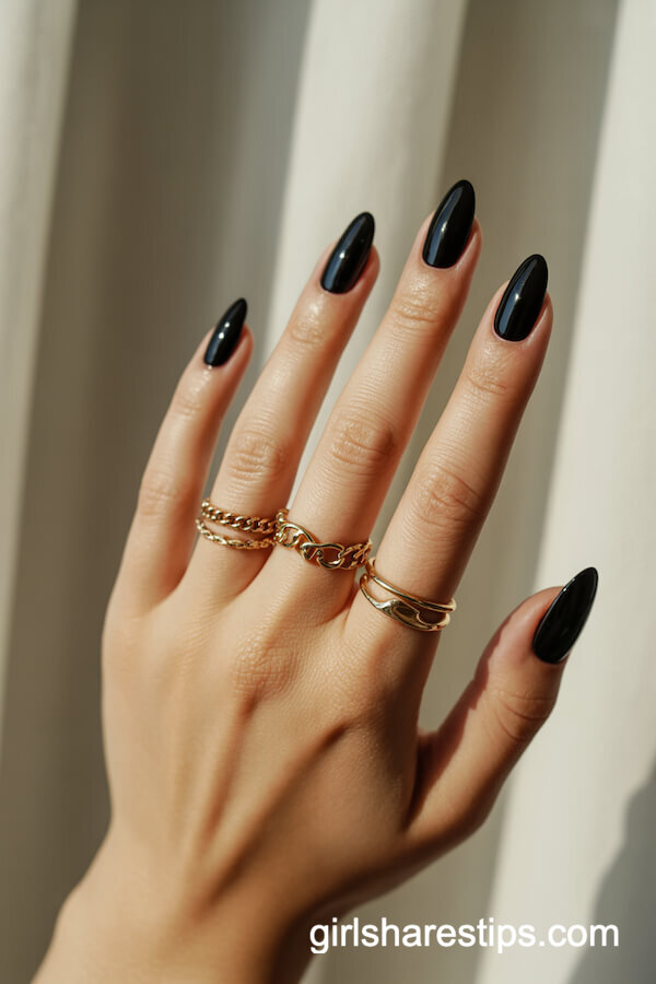 Glossy Black Nails with Gold Rings