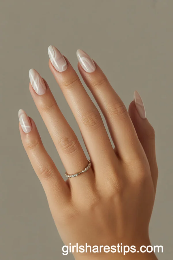 Almond Nails with Beige Marble Elegance