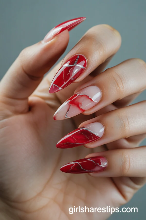 Red Marble Stiletto Nails with Silver Veins