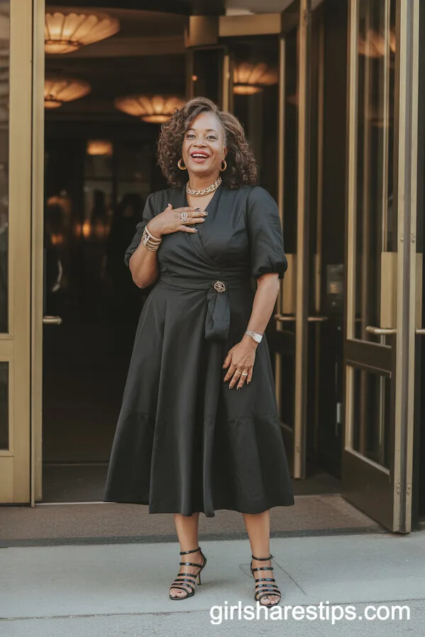 Evening Glam: Black Midi Dress with Gold Accessories