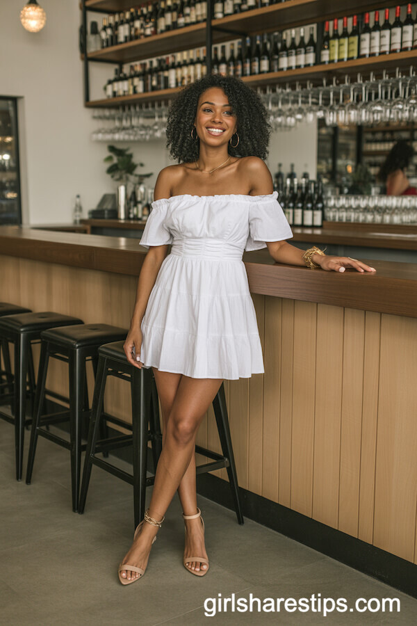 White Ruffle Mini Dress and Gold Accessories for Wine Bars