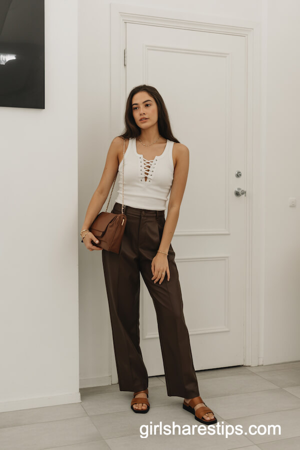 White Tank Top And Wide Leg Trousers With Flat Sandals