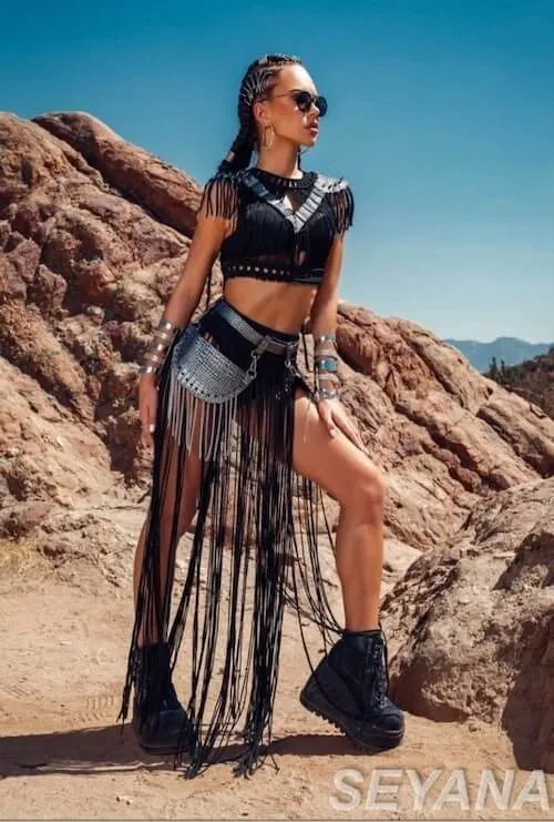 a woman wearing burning man festival outfit