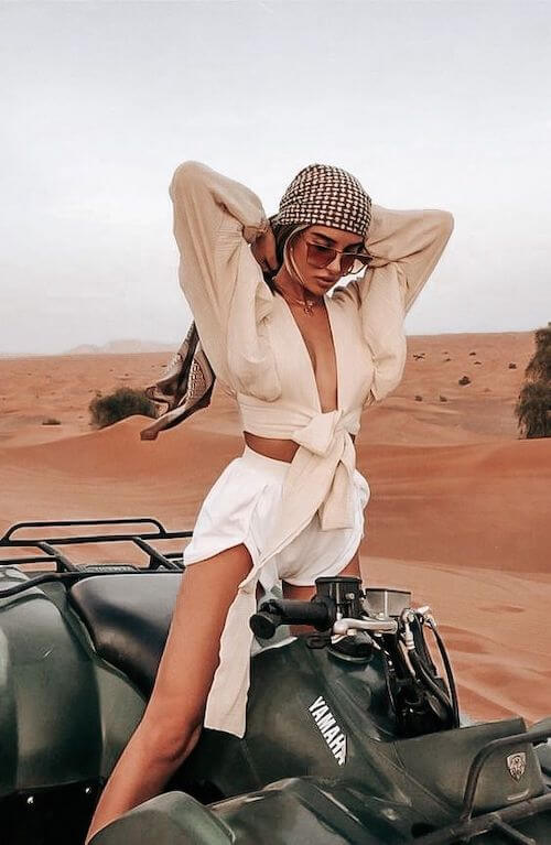 woman wearing bandana, cute top and white shorts