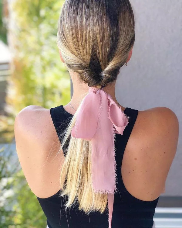 Low Twist Ponytail with Pink Ribbon