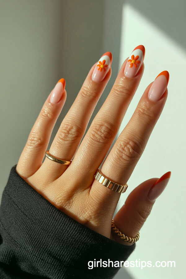 Alternating White and Orange French Tips with Flowers