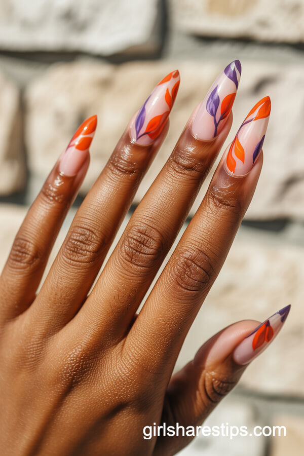 Translucent orange purple floral stiletto nails