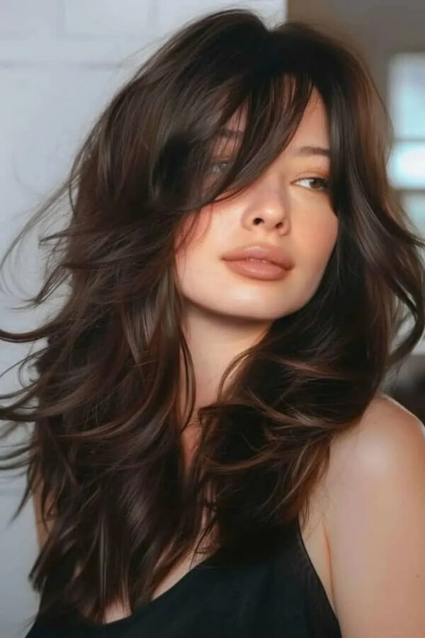 Layered Blowout with Curtain Bangs