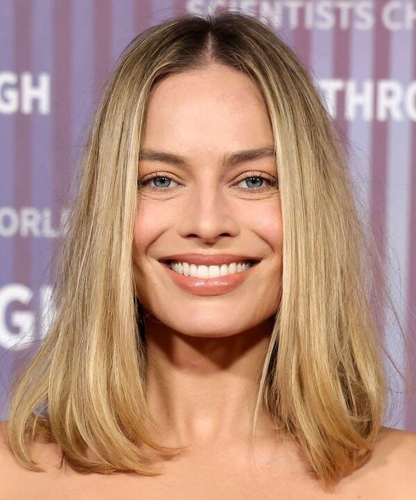 Sleek Center-Parted Smooth Hair
