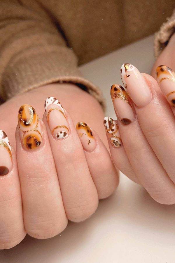 Abstract Fall Tortoise Shell Nails with Gold Accents