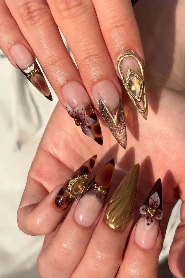 Glamorous Stiletto Tortoise Shell Nails with Jewels