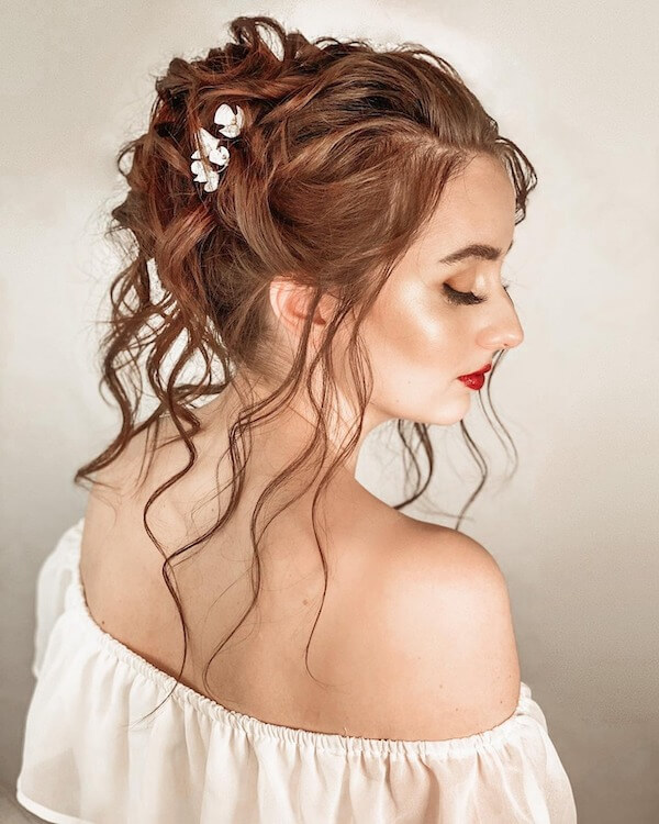 Romantic Curly Updo with Floral Accents