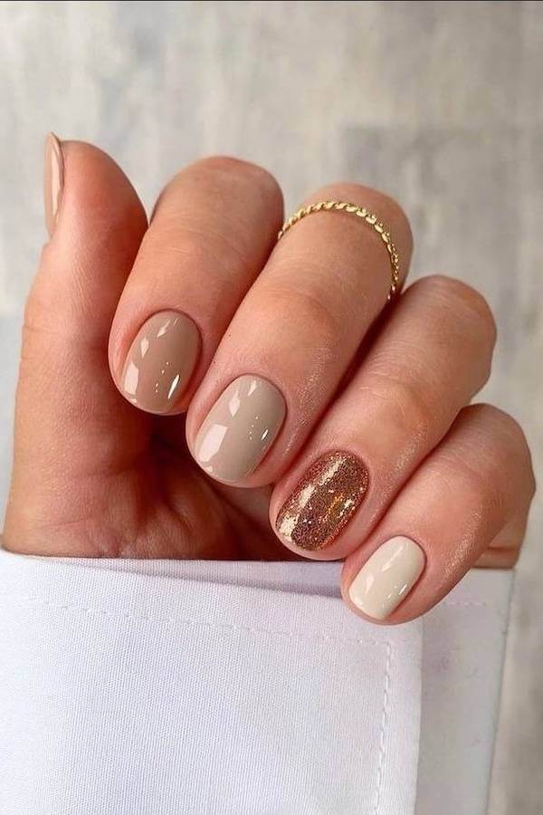 Beige Nails with Gold Glitter Accent