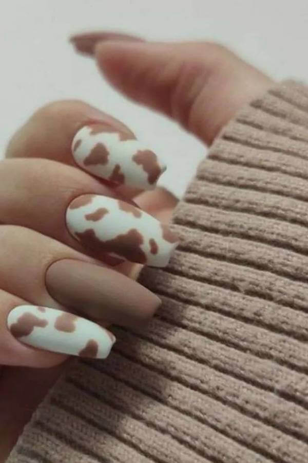 Matte Nude and Cow Print Nails