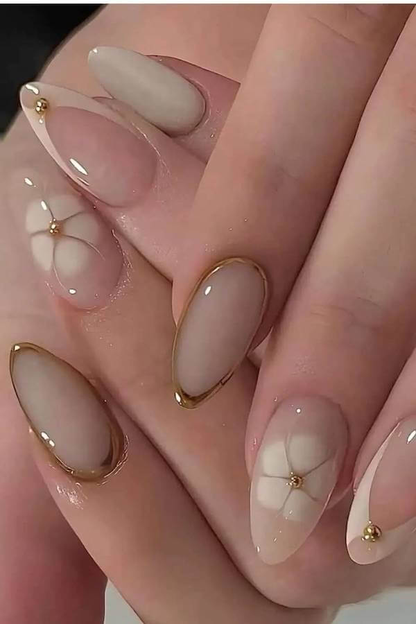 Nude Nails with Gold Outlines and Floral Art