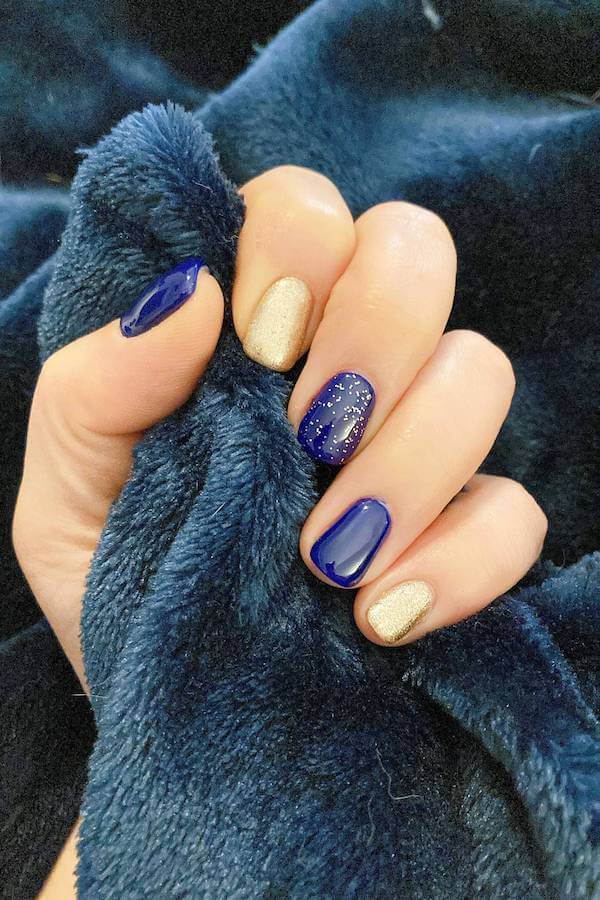 Navy Blue and Gold Accent Nails