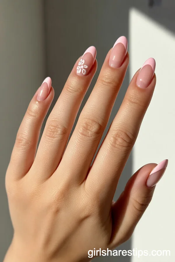 Soft Pink French Tips with Minimalist White Floral Accent