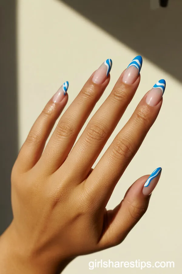 Blue Wave Tip Almond Nails: Coastal Summer Art