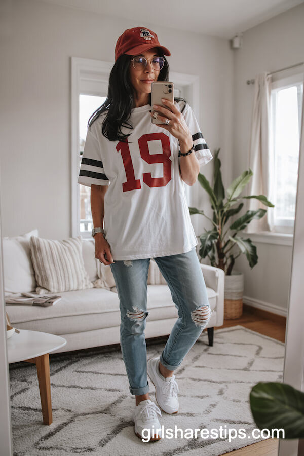 Football T-Shirt, Cap, and Ripped Skinny Jeans