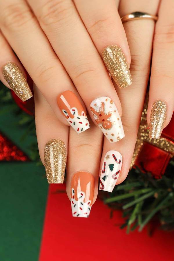 Festive Gold And Reindeer Christmas Nails