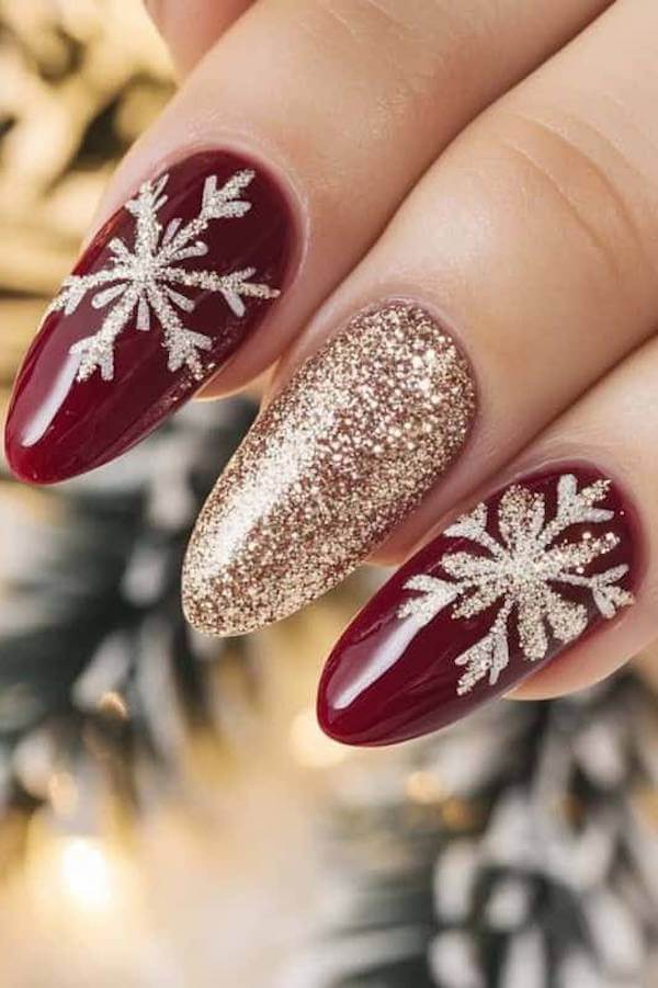 Burgundy And Gold Glitter Snowflake Nails