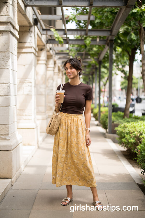 Brown Tee with Floral Yellow Skirt and Straw Bag