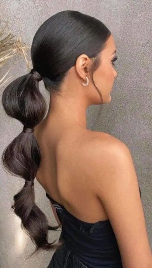 Trendy Bubble Ponytail graduation hairstyles for long hair