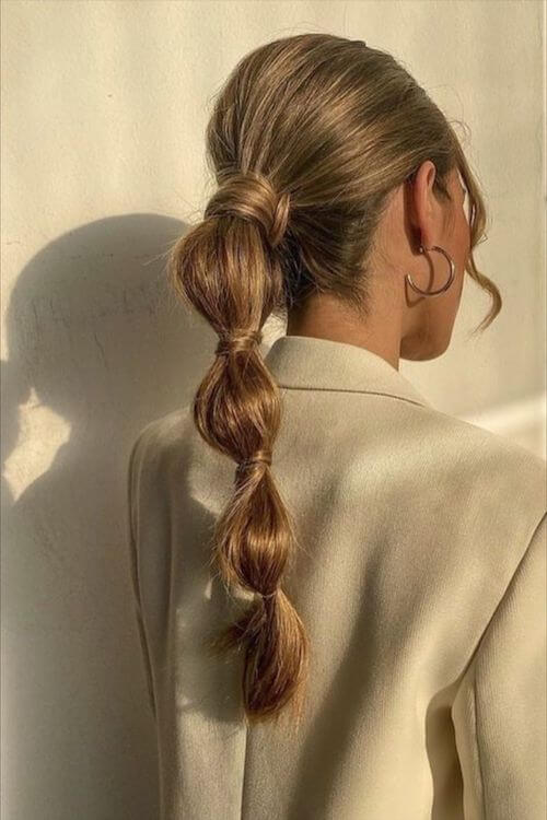 Trendy Bubble Ponytail graduation hairstyles for long hair