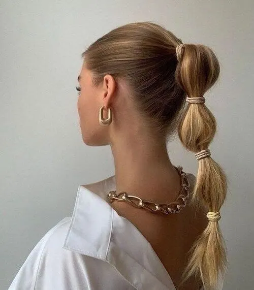 Trendy Bubble Ponytail graduation hairstyles for long hair