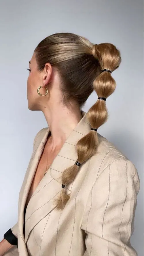 Trendy Bubble Ponytail graduation hairstyles for long hair