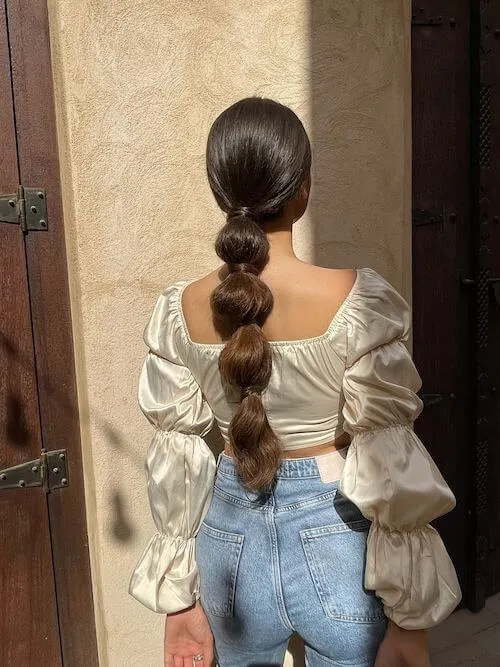 Trendy Bubble Ponytail graduation hairstyles for long hair