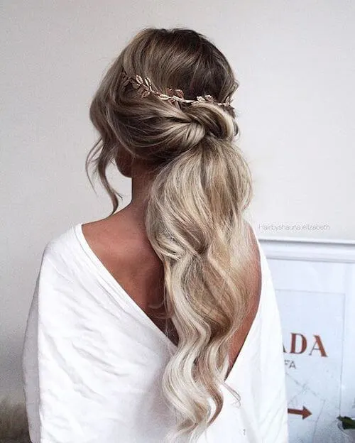 Textured Low Ponytails graduation hairstyles for long hair