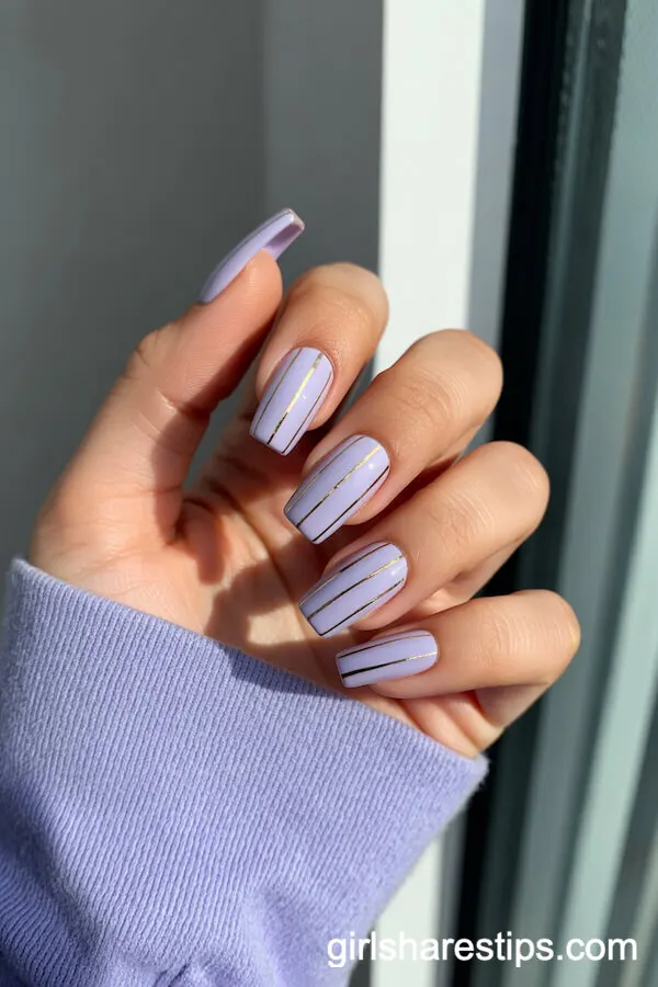 Coffin Nails with Light Purple and Gold Metallic Stripes