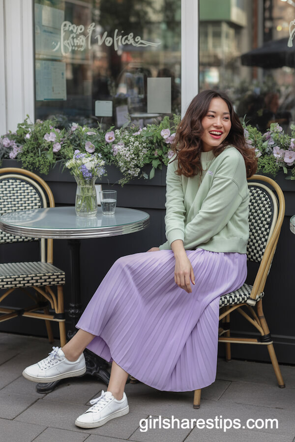 Lavender Pleated Skirt with Mint Pullover and White Sneakers