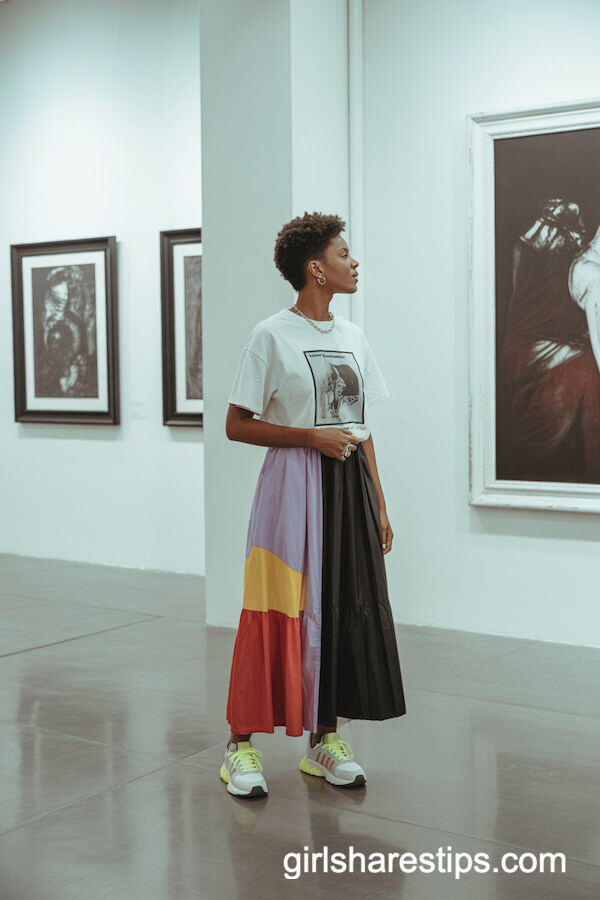 Color-Blocked Skirt with Graphic Tee and Neon Sneakers